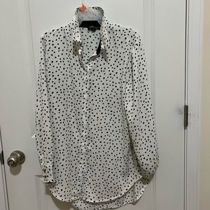 White polka dot shirt